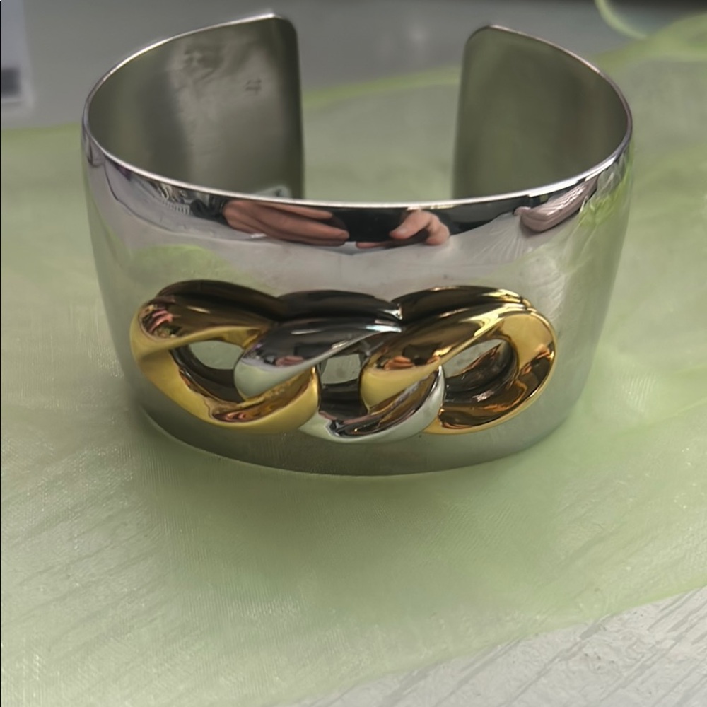 Stylish Silver Cuff with Gold Chain Accent
